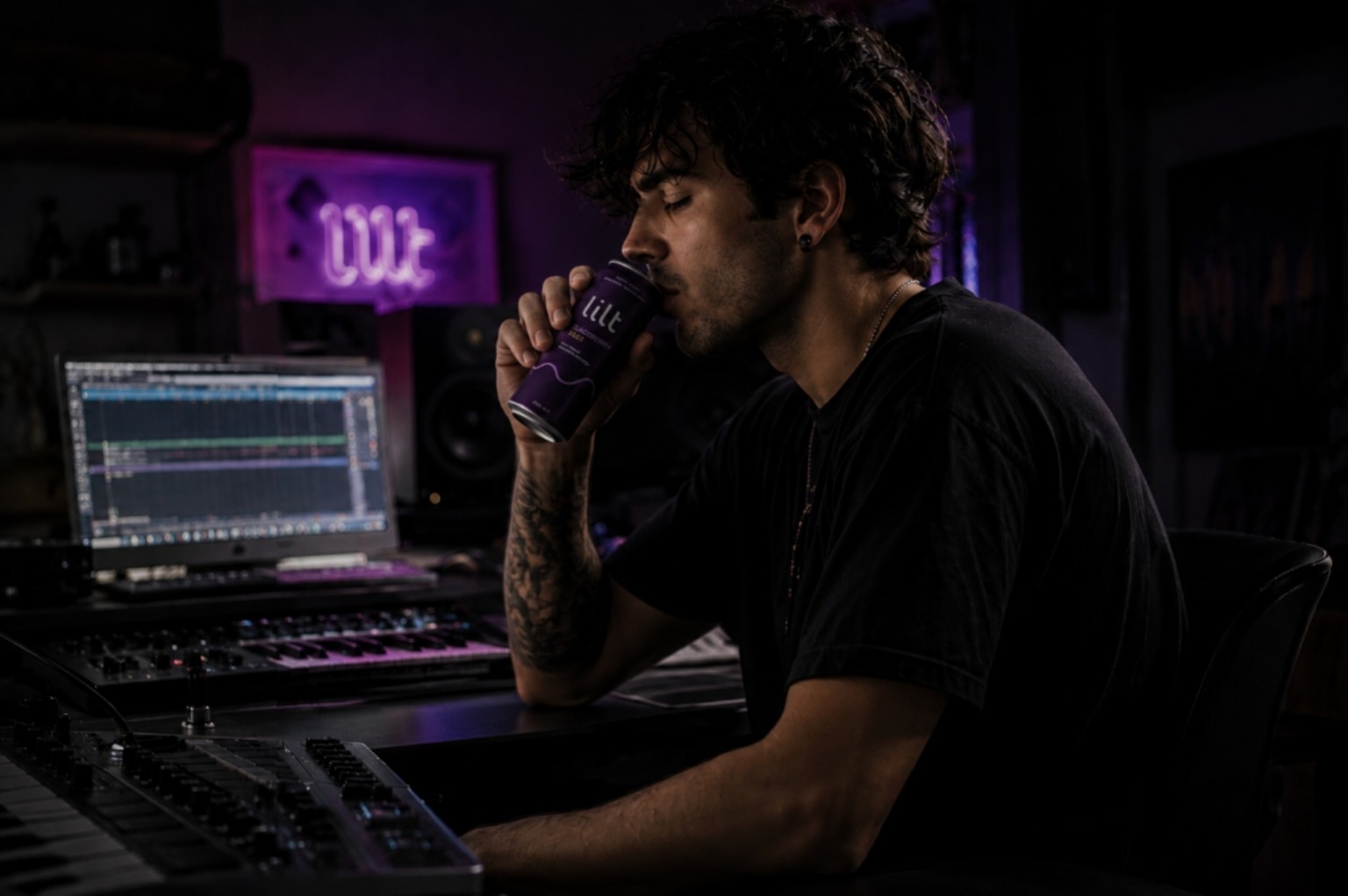 Noah, 27, producer, drinking LILT Blackberry + Sage in his music studio